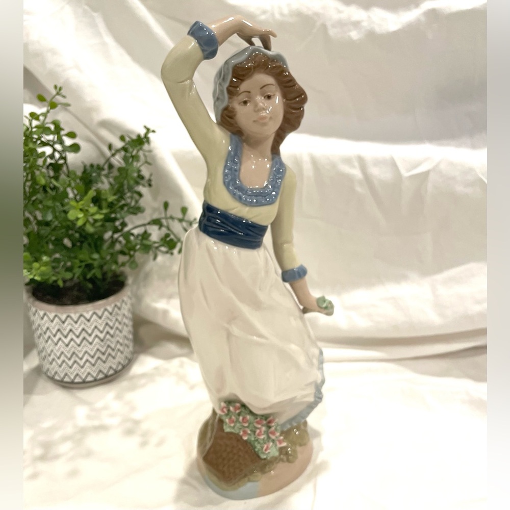 Retired Nadal “Girl w Flowers” Hand Painted Porcelain Figurine. Spain. Repaired.